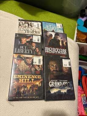 Sealed DVDs:GrandIsleEminenceHillOutof LibertyBostonHostageJohnLightUnsungHeroes